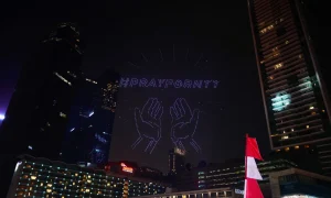 “Pray for NTT” Pesan dan Doa di Langit Jakarta saat Malam Merdeka Pray for NTT1
